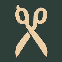 Beige icon of scissors on green background